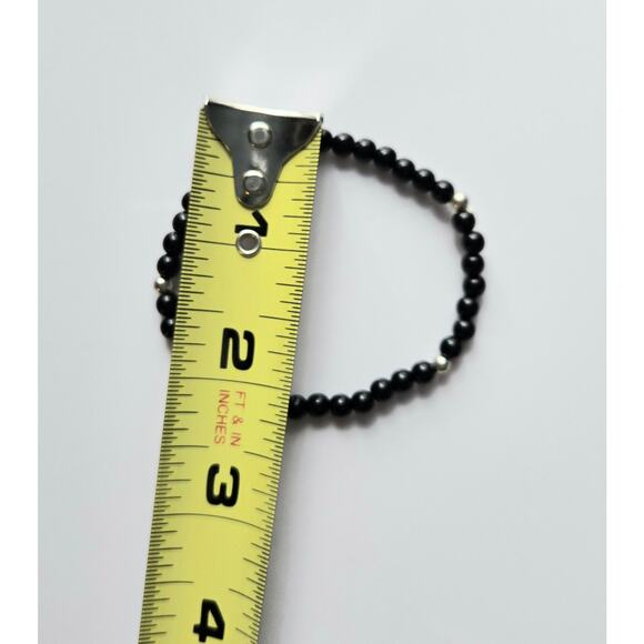 Two Stretchy Black Bracelets with Silver Toned Spacers - Picture 10 of 11